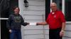 Angie Seifert receiving check from Bill Rusch